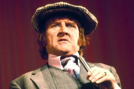 Norman Collier on stage.jpg