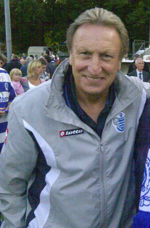 20111023214701!Warnock with a fan during Pre-Season 2011 cropped - Neil Warnock - Wikipedia (1).png