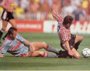 Wilf Rostron fouled by Steve Nicholl.jpg