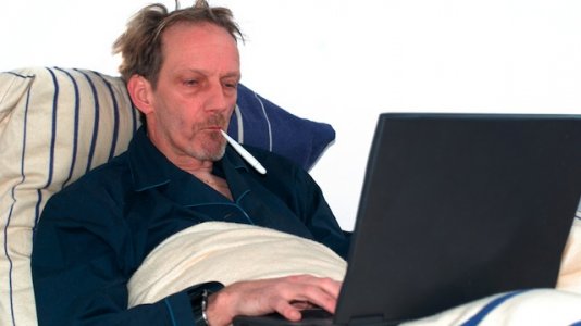 Sick-guy-on-computer.jpg