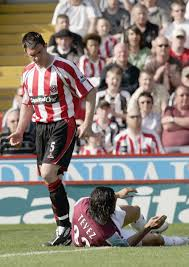 Morgan and Tevez.png