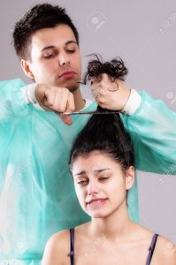6979939-portrait-of-a-barber-cutting-female-hair-Stock-Photo-hairdresser.jpg