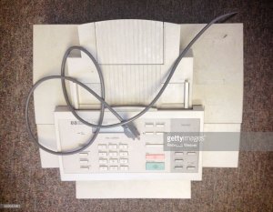 489055821-discarded-fax-machine-gettyimages.jpeg