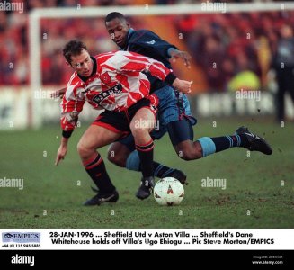 28-jan-1996-sheffield-united-v-aston-villa-sheffields-dane-whitehouse-holds-off-villas-ugo-ehi...jpg