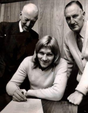 TC signes a new contract the year will have to be worked out by the length of his hair. Dick W...jpg