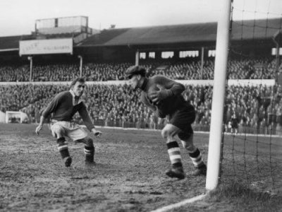 1950's Ted Burgin gathers the ball.jpg