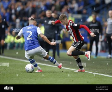 david-brooks-of-sheffield-utd-nutmegs-jack-hunt-of-sheffield-wednesday-during-the-championship...jpg