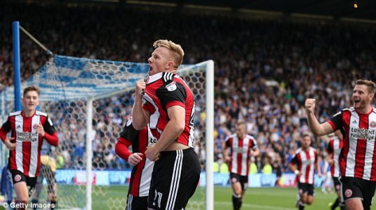 44AB6A8D00000578-4914824-Mark_Duffy_roars_to_the_crowd_after_scoring_an_incredible_solo_e-a-60...jpg