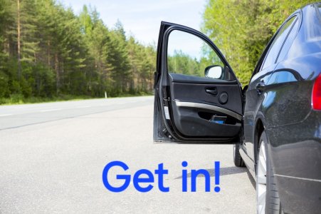 a-black-vehicle-with-an-open-door-is-parked-at-the-side-of-the-road.jpg
