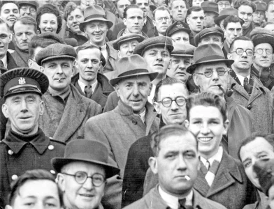Billy Gillespie the Blades fan date unk.could be war time 39-45 RAF Officers cap Kings crown ...webp
