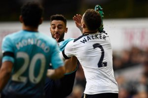 Swansea-Citys-Neil-Taylor-catches-Tottenhams-Kyle-Walker-in-the-face-with-his-foot.jpg