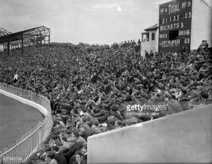 general-view-of-the-crowd-sat-in-the-bomb-damaged-stands-at-bramall-picture-id637483194.jpg