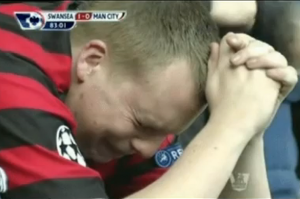 Grim+weeper-+A+Manchester+City+fan+breaks+down+as+Swansea+deal+them+a+huge+blow+in+the+title+rac.png