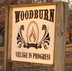 Woodburn,_Illinois_village_sign.png