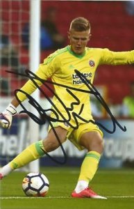 SHEFFIELD-UNITED-JAKE-EASTWOOD-SIGNED-6x4-ACTION-PHOTO-COA.jpg