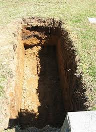 Freshly dug grave.jpg