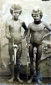 170px-Two_Kanak_(Canaque)_warriors_posing_with_penis_gourds_and_spears,_New_Caledonia.jpg