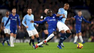 Fernandinho holds off Kante FOUR.jpg