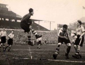1952-sheff_utd_v_newport co_fac_w2-0-12 Jan 1952 LtoR McLafferty M Shaw J Burgin E  unknown La...jpg