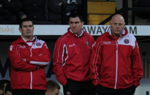 Three_glum_faces_at_Notts_County.png