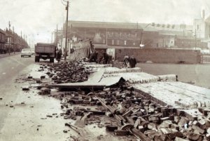Aftermath of gale 1962 Shorham St perimeter wall behind Kop also blew down floodlight pylon co...jpg