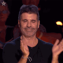 clapping-simon-cowell.gif